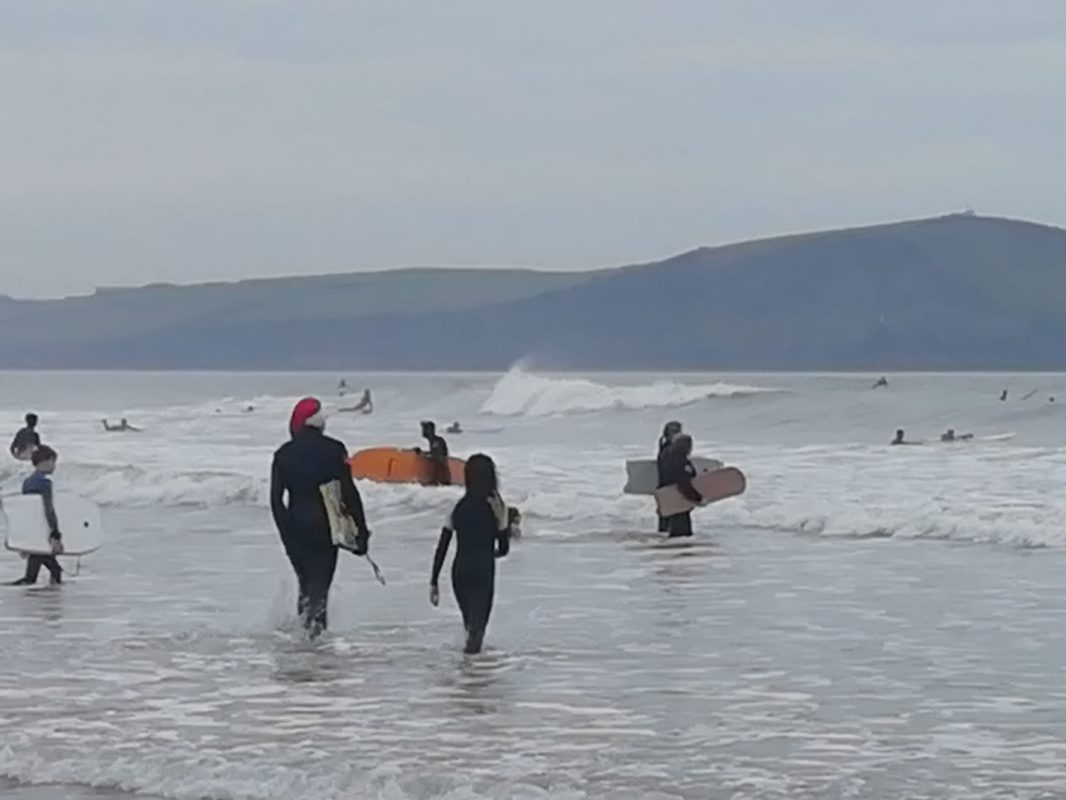 Christmas fun in the Surf at Polzeath, North Cornwall