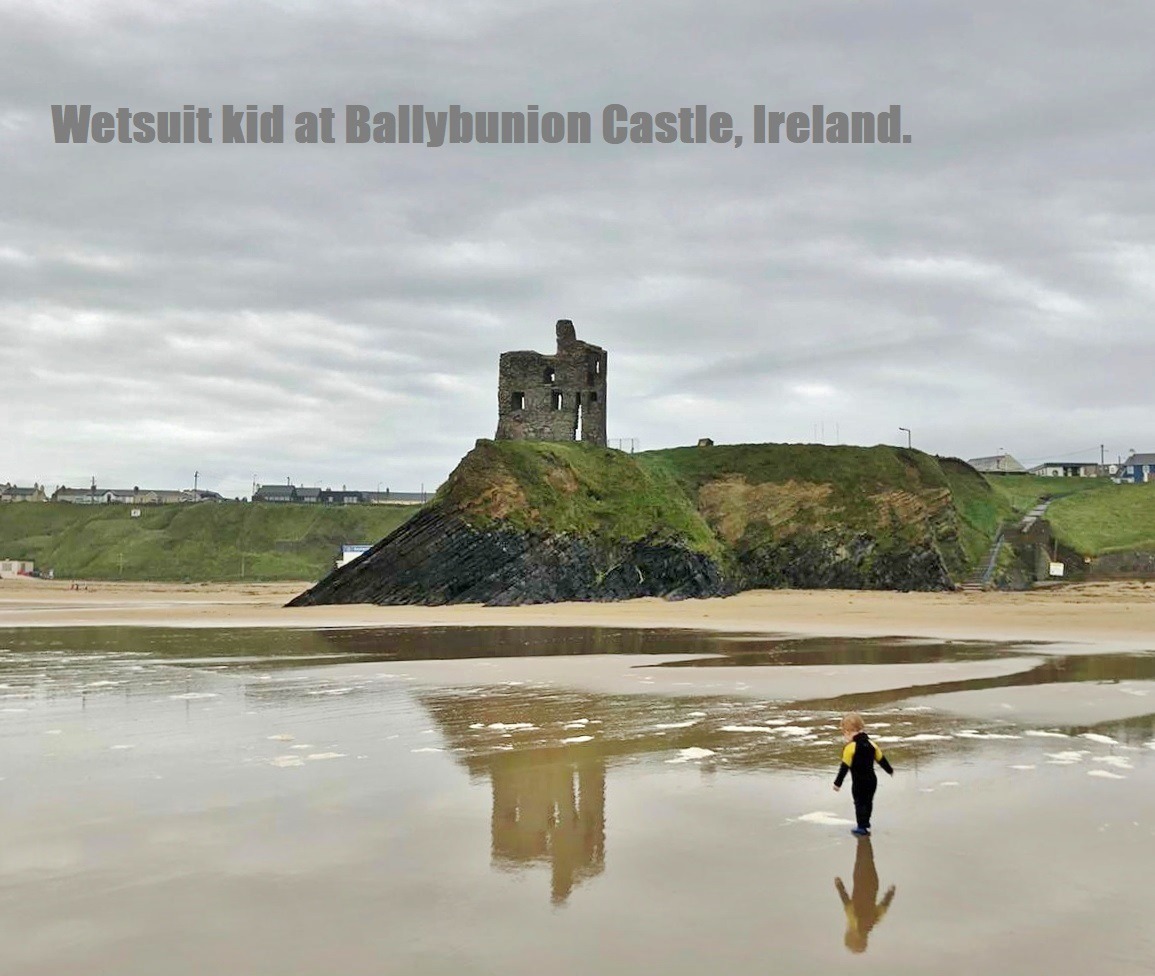 Wetsuit kid at Ballybunion Castle, Ireland. NCW kiddy wetsuit in action.