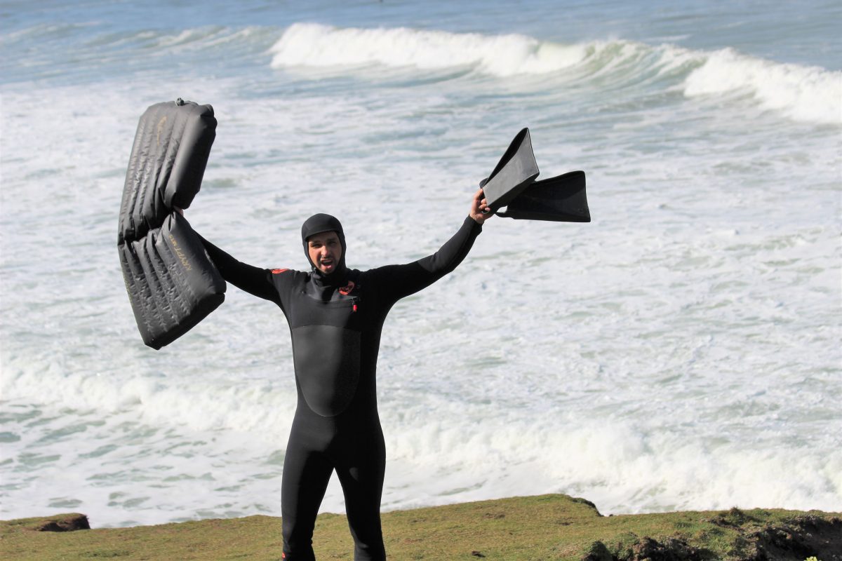 Mat surfer surfing in winter